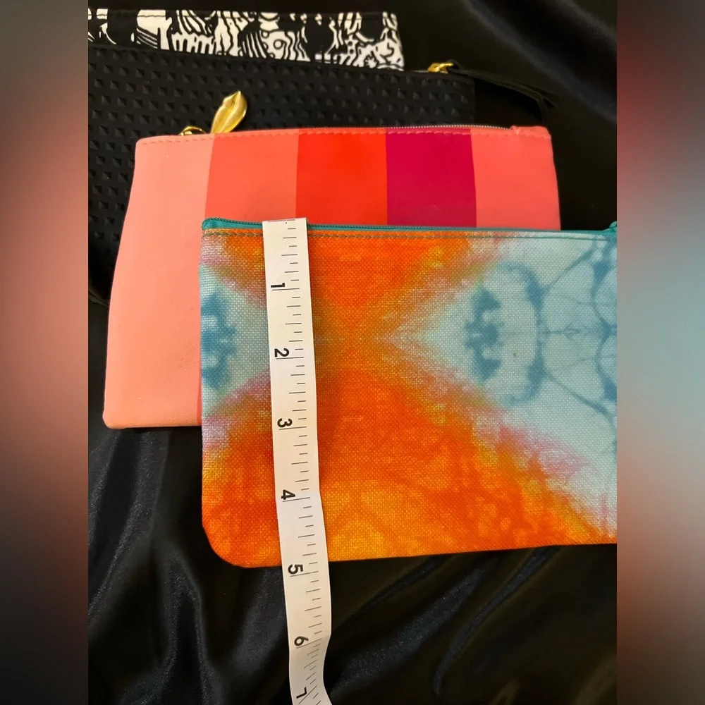Four never used Ipsy cosmetic bags. Great for your girls birthday parties.